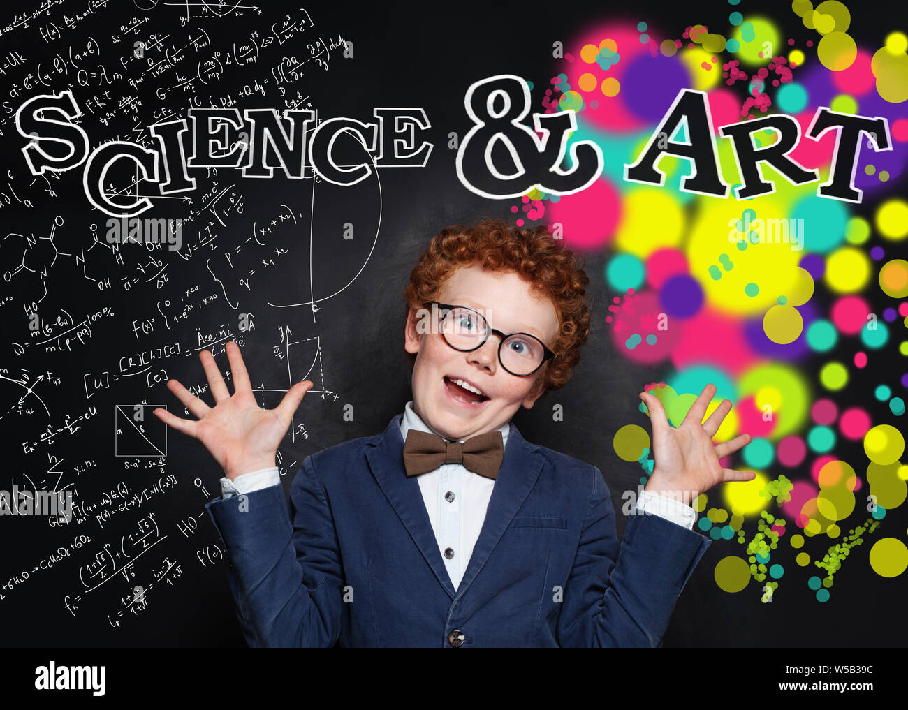 Little boy on blackboard background with maths formula and art pattern Stock Photo