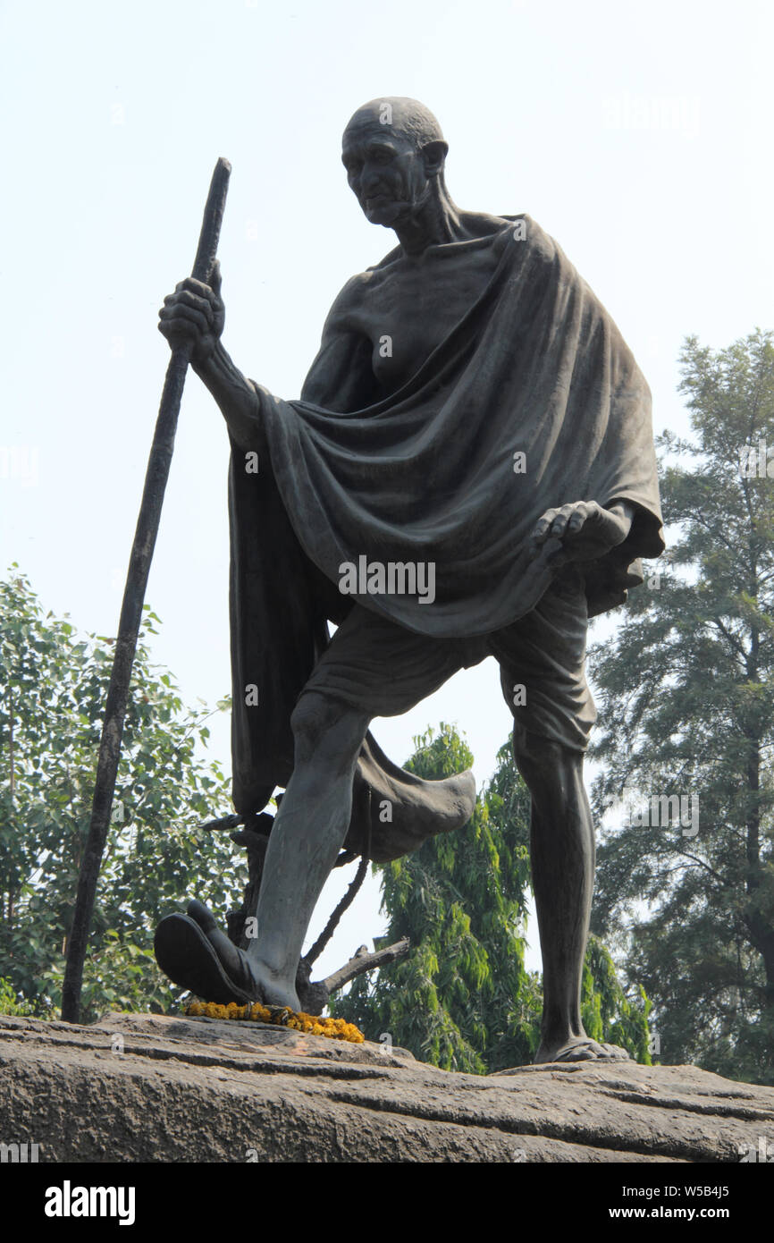Low angle view of a statue of Mahatma Gandhi, New Delhi, India Stock Photo