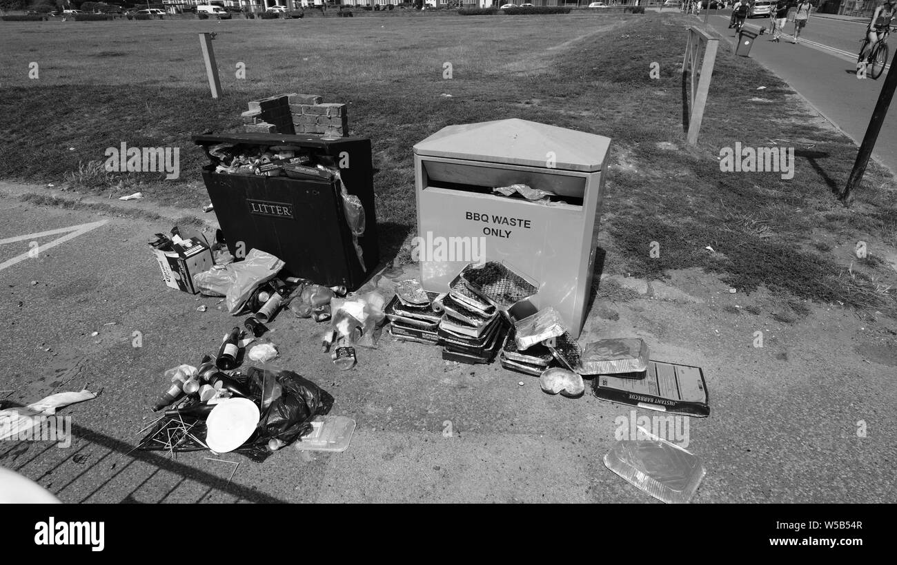 Yellow bin and yellow bags for plastic waste Black and White Stock