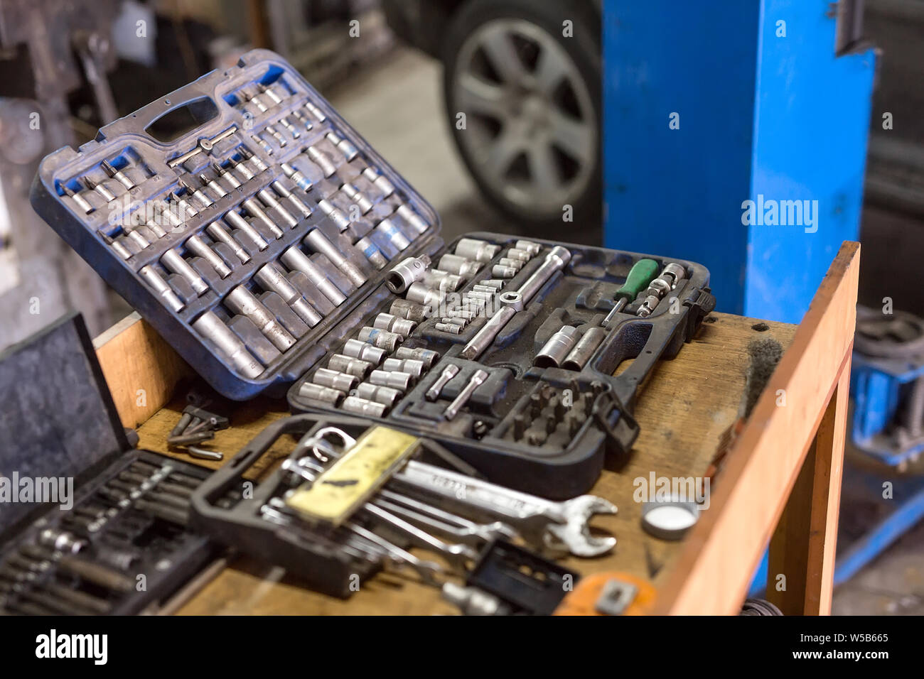 Wrenches for car repairs. Auto mechanic working in garage. Repair