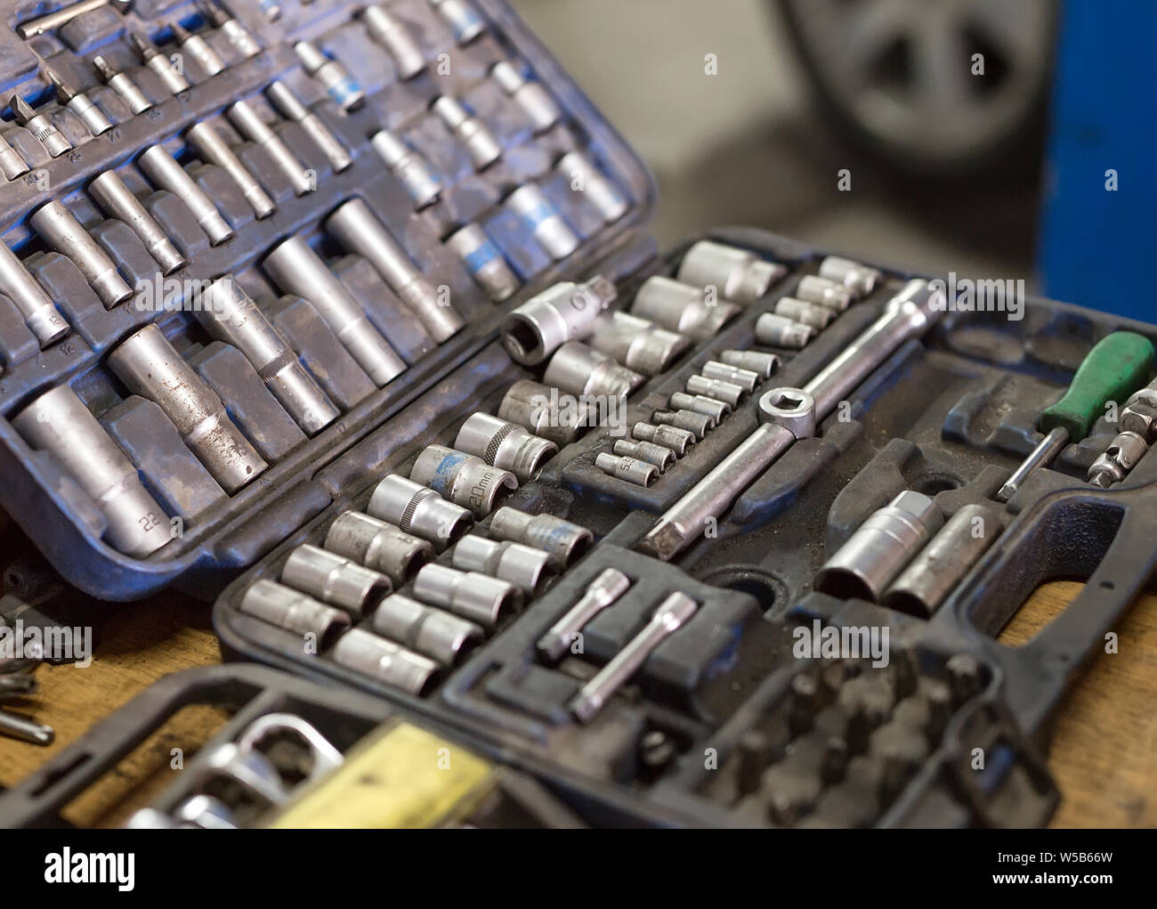 Wrenches for car repairs. Auto mechanic working in garage. Repair