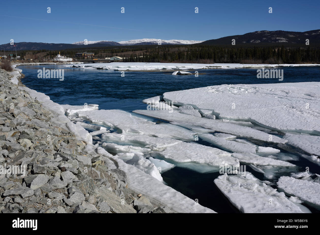 The paddleship Klondike and melting ice in the Yukon River, Whitehorse