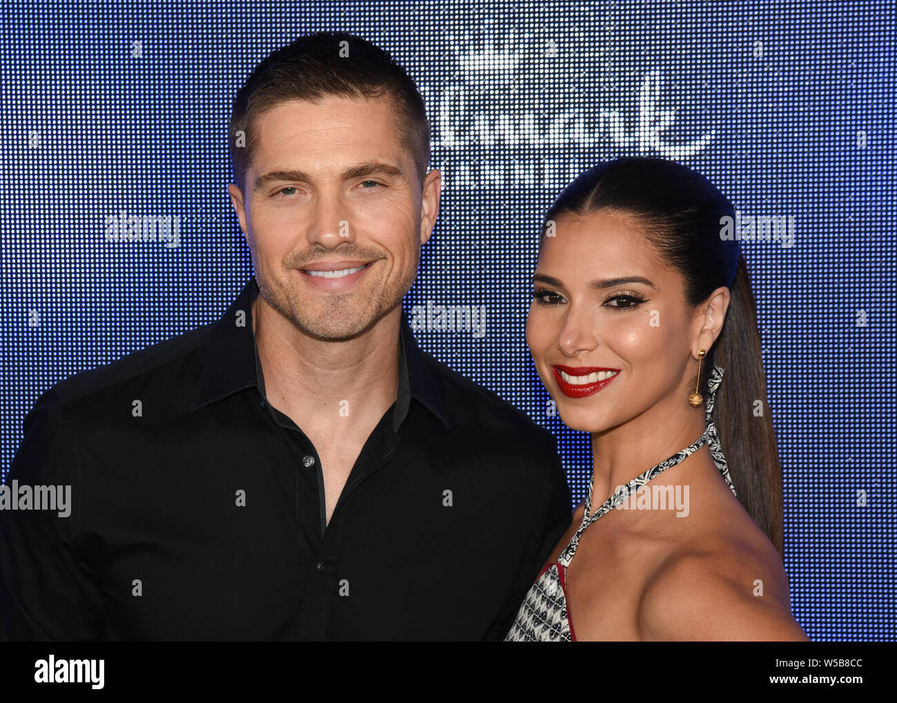 Los Angeles, USA. 26th July, 2019. Eric Winter and Roselyn Sánchez attends the Hallmark Channel and Hallmark Movies & Mysteries Summer 2019 TCA at Private Residence, Beverly Hills, California on July 26, 2019. Credit: The Photo Access/Alamy Live News Stock Photo