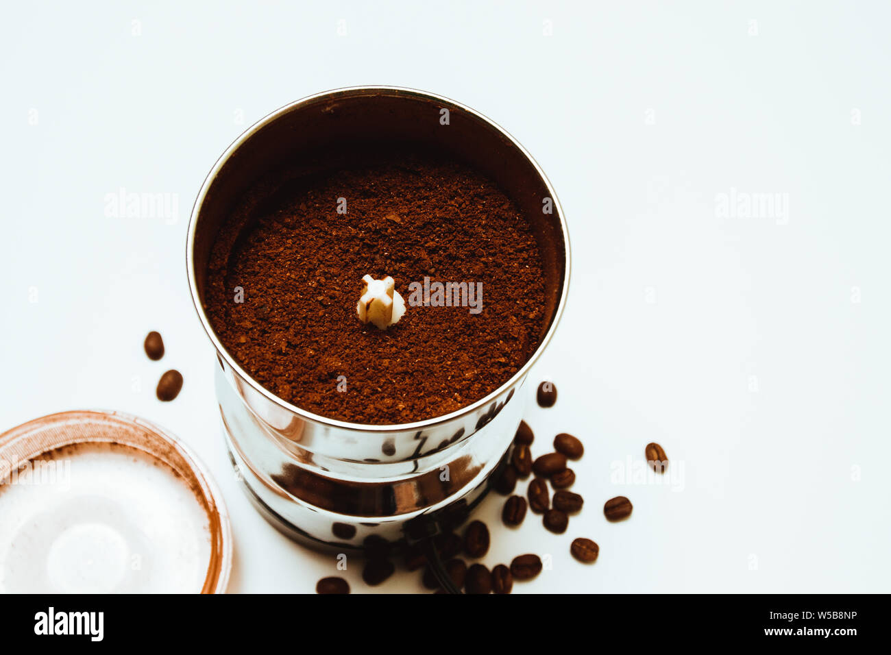 Coffee beans and a grinder Stock Photo Alamy
