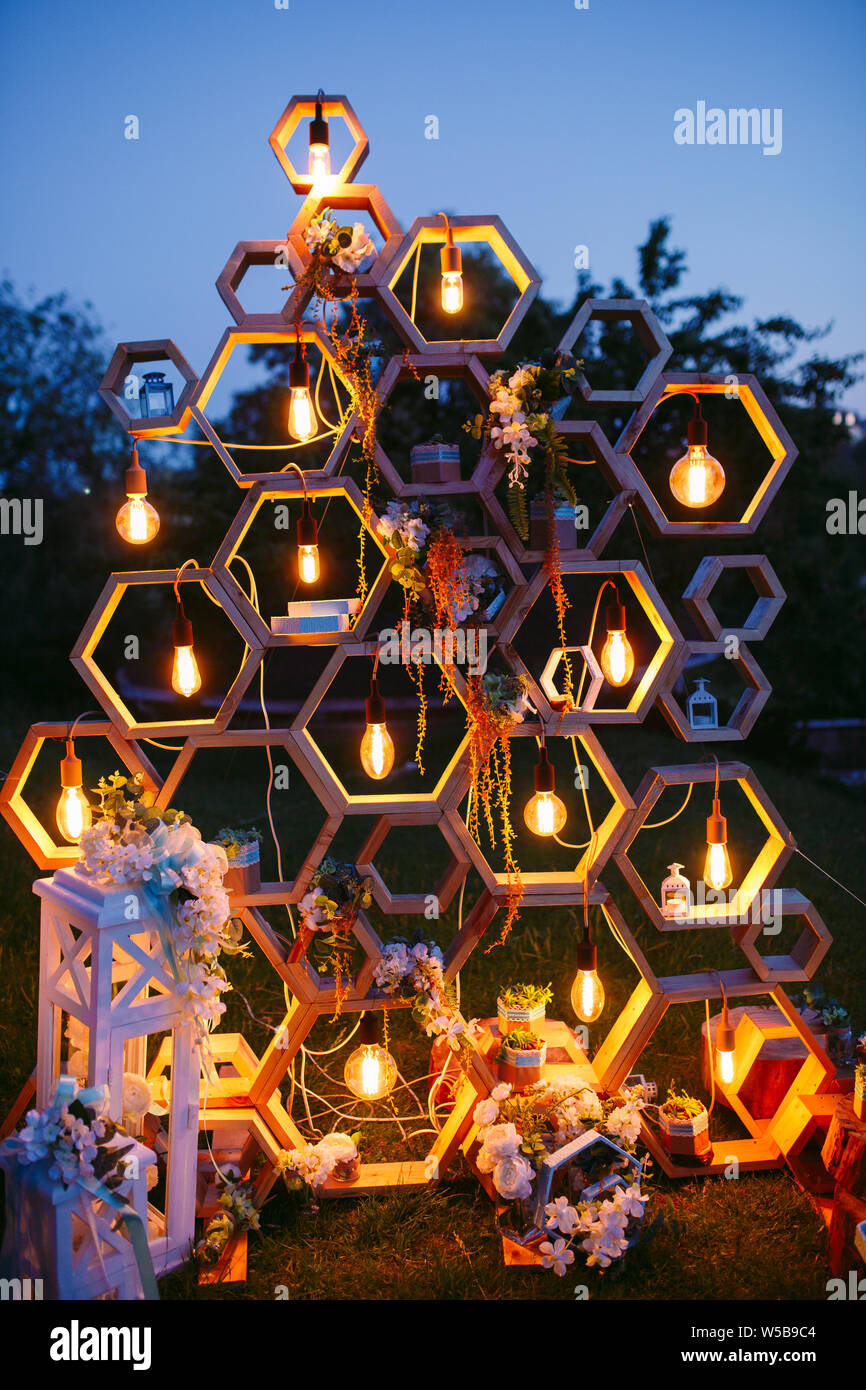 Wedding Arch at the ceremony. Light Bulb, Edison decorative elements ...