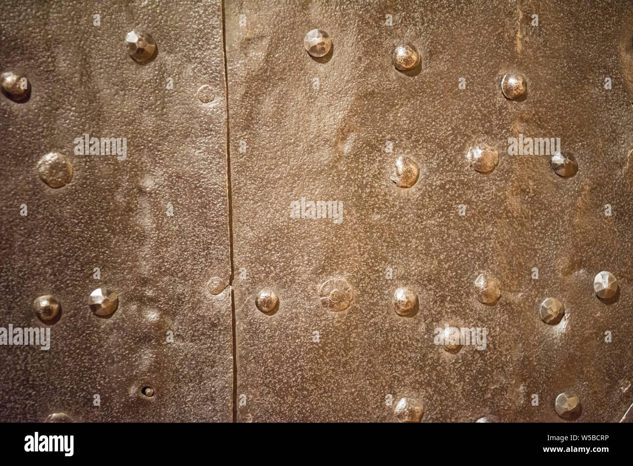 Metal rusty background with rivets Stock Photo - Alamy