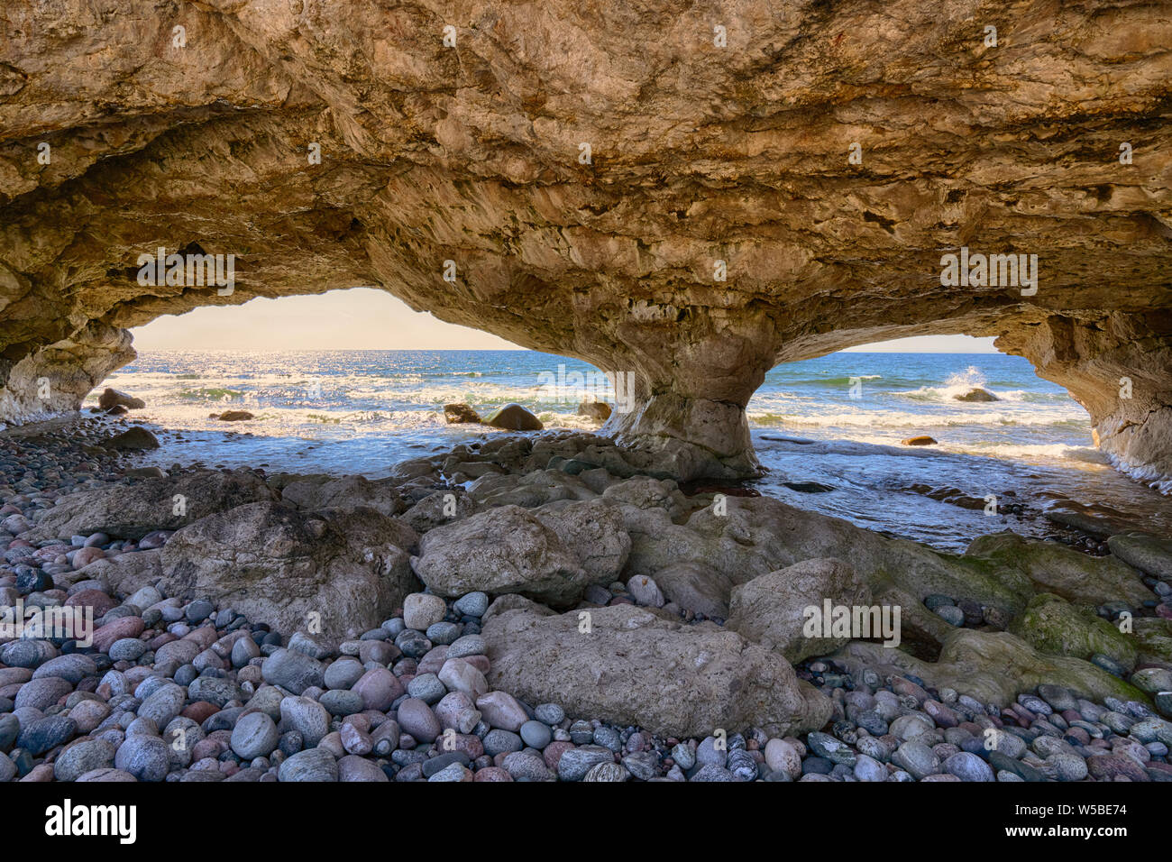 Arches along the coast of the Gulf of St Lawrence in Arches Provincial Park in Newfoundland, Canada Stock Photo