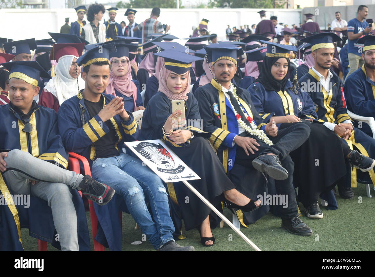 Aden, Yemen. 27th July, 2019. Yemeni university graduates attend a