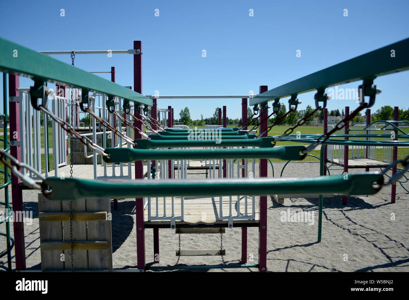 Colourful playground monkey bars in school yard Stock Photo Alamy