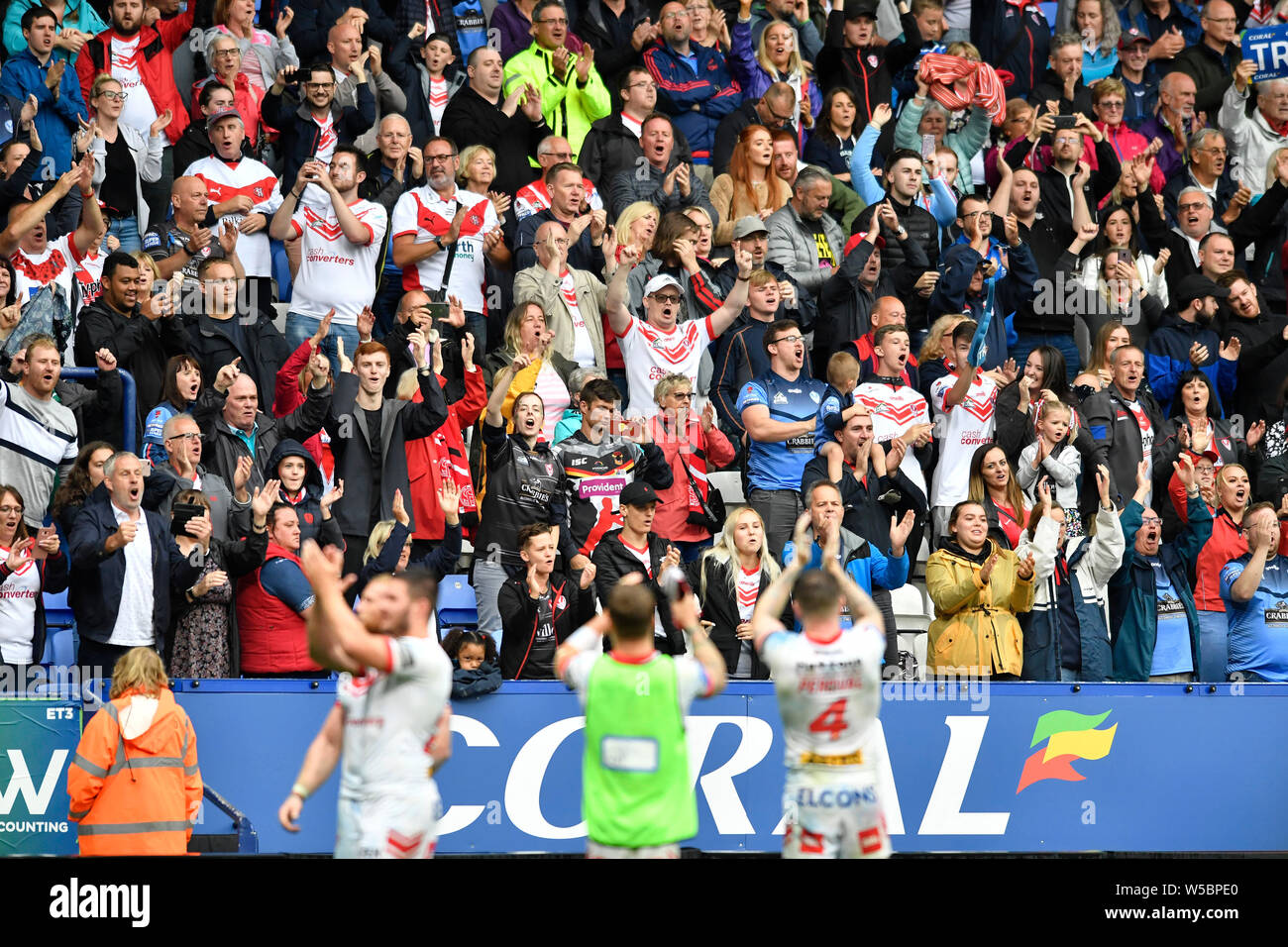 Bolton, UK. 27th July, 2019. Coral Challenge Cup Semi Final St Helens versus Halifax; The St Helens fans celebrate their team progressing to the Coral Challenge Cup Final after beating Halifax RLFC 26 - 2 Credit: Action Plus Sports Images/Alamy Live News Stock Photo