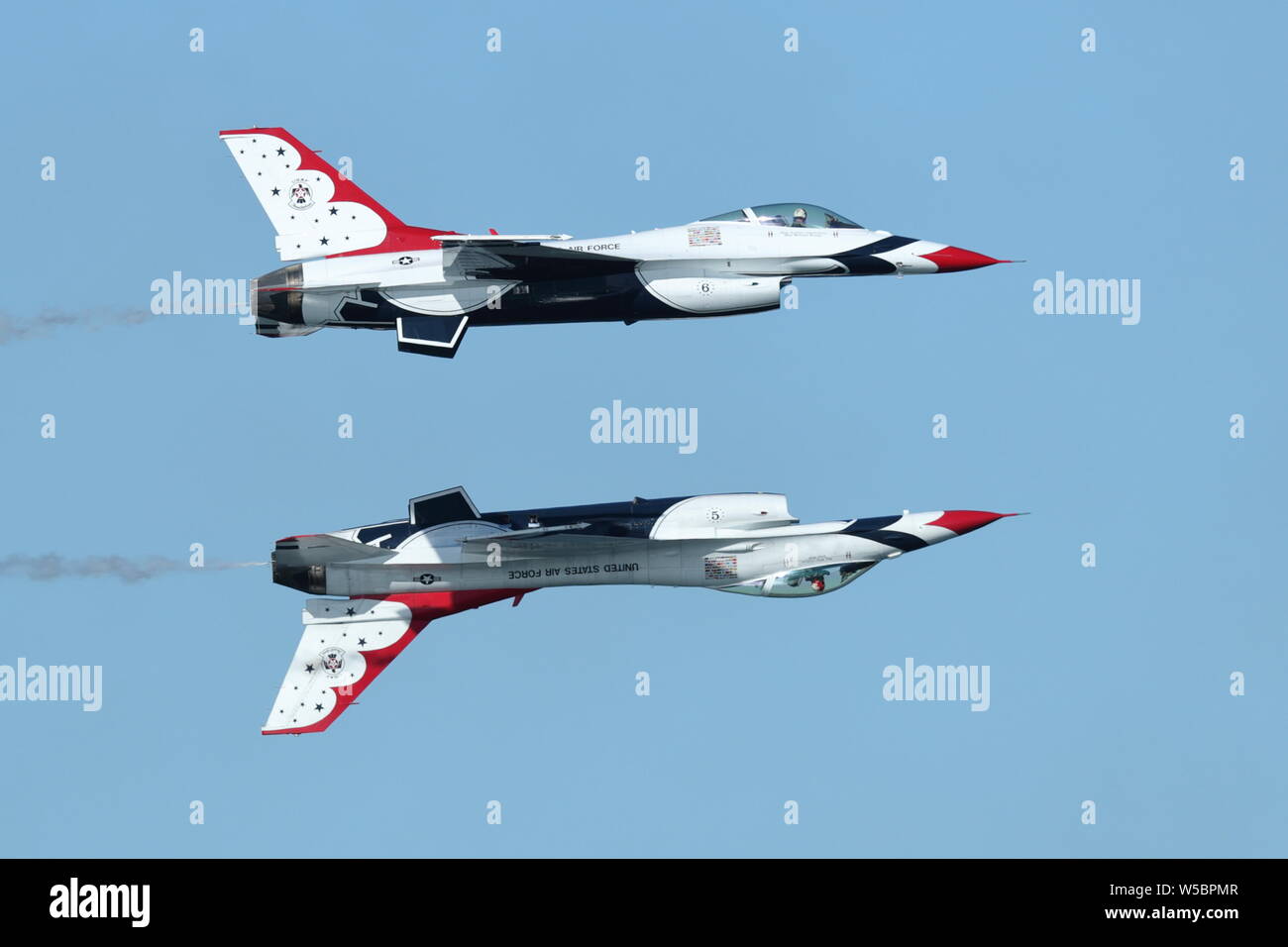 Air Force Thunderbirds performing a Reflection Pass in their F16C's at the Great Pacific Airshow in Huntington Beach, California on October 19, 2018 Stock Photo