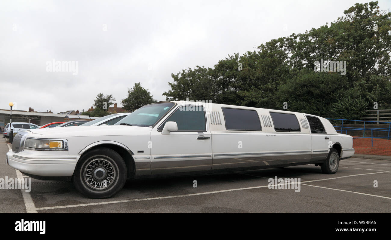 Stretch Limousine, Limo, Lincoln manufacture, car, vehicle, taking 2 bays, parking bays Stock Photo