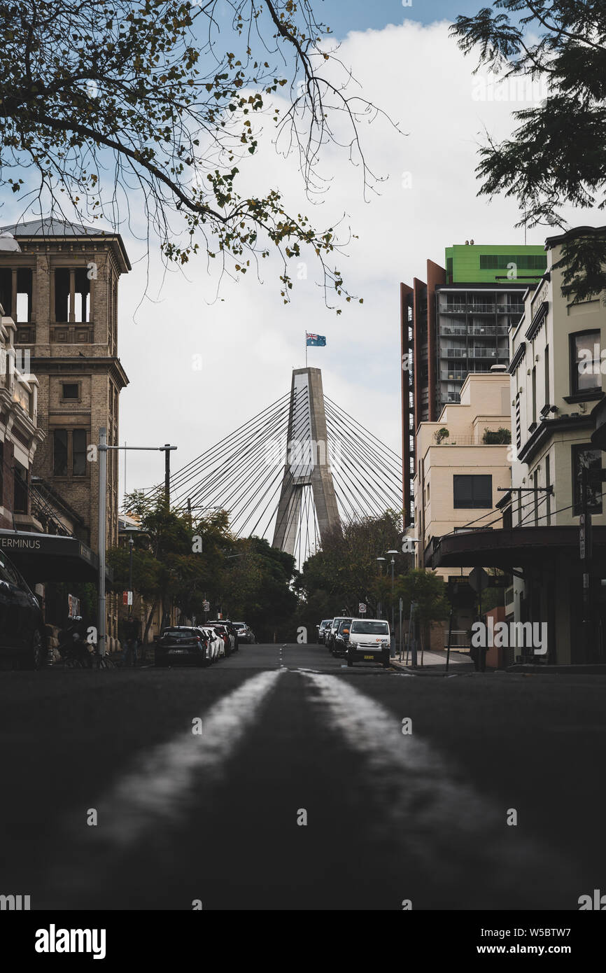 Pyrmont, New South Wales - JUNE 24th, 2019: Anzac Bridge framed by the buildings on John Street, Pyrmont. Stock Photo