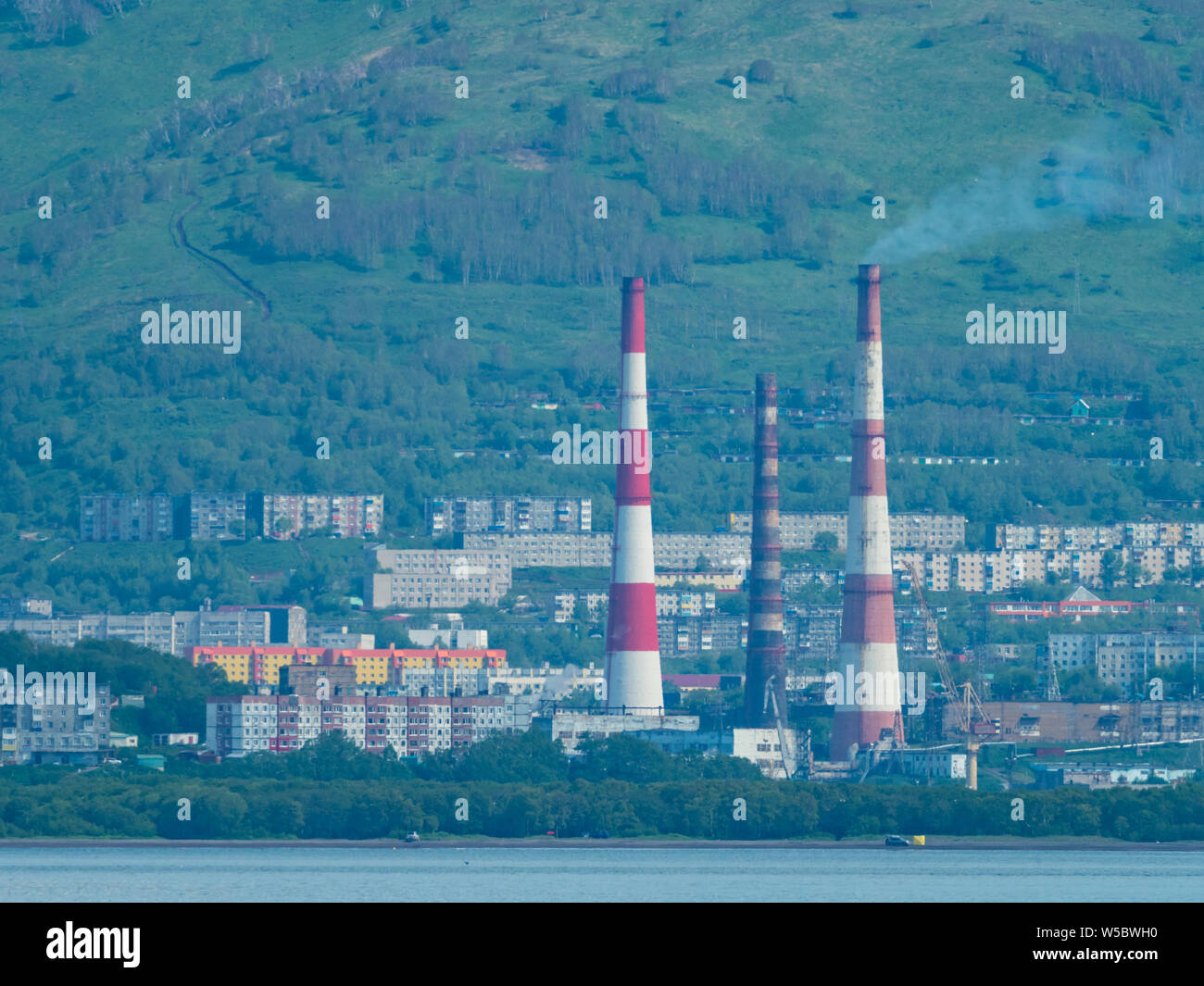 The smokestacks in the city of Petropavlovsk-Kamchatsky, Kamchatka, Russia Stock Photo
