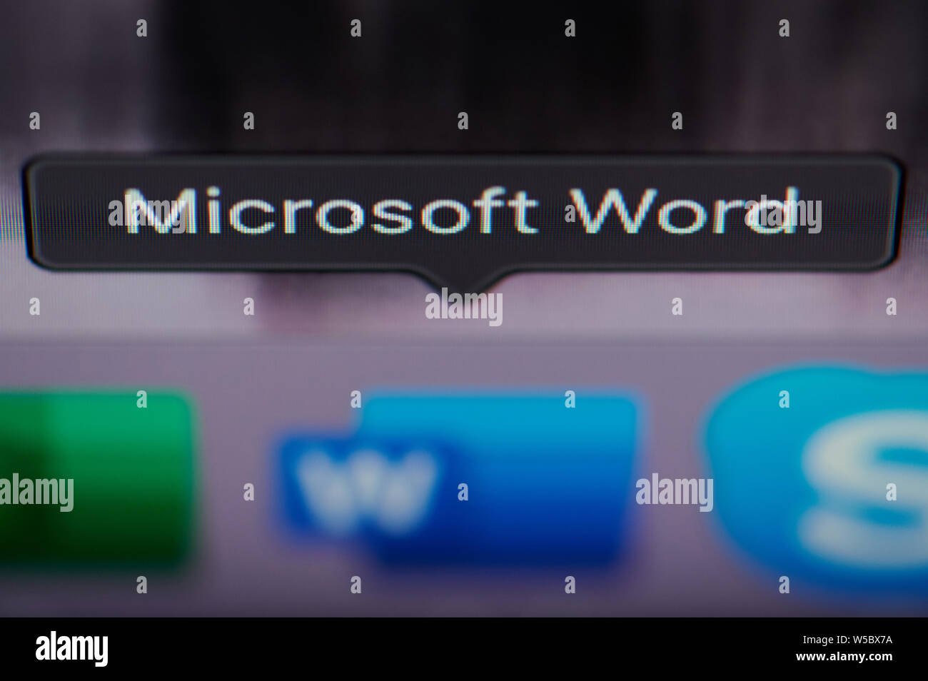 New york, USA - july 26, 2019: Selecting microsoft word application on computer macro close up view in pixel screen Stock Photo