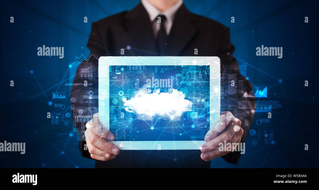 Hand holding tablet with cloud technology and dark concept Stock Photo ...