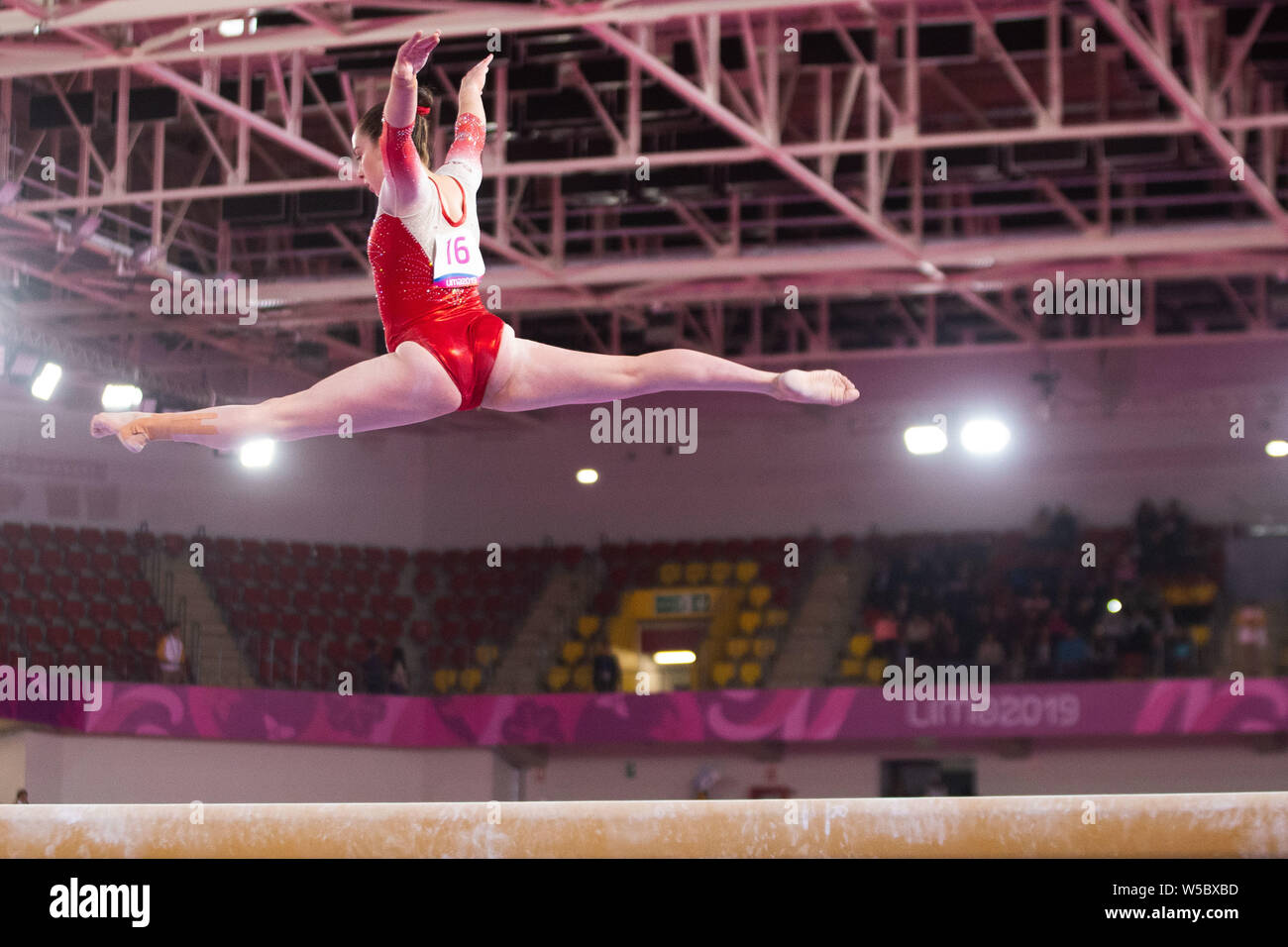 Lima, Peru. 27th July, 2019. Isabela Onyshko of Canada (#16) performs her beam routine during the Pan American Games Women's Artistic Gymnastics, Qualification and Team Final at Polideportivo Villa el Salvador in Lima, Peru. Daniel Lea/CSM/Alamy Live News Stock Photo