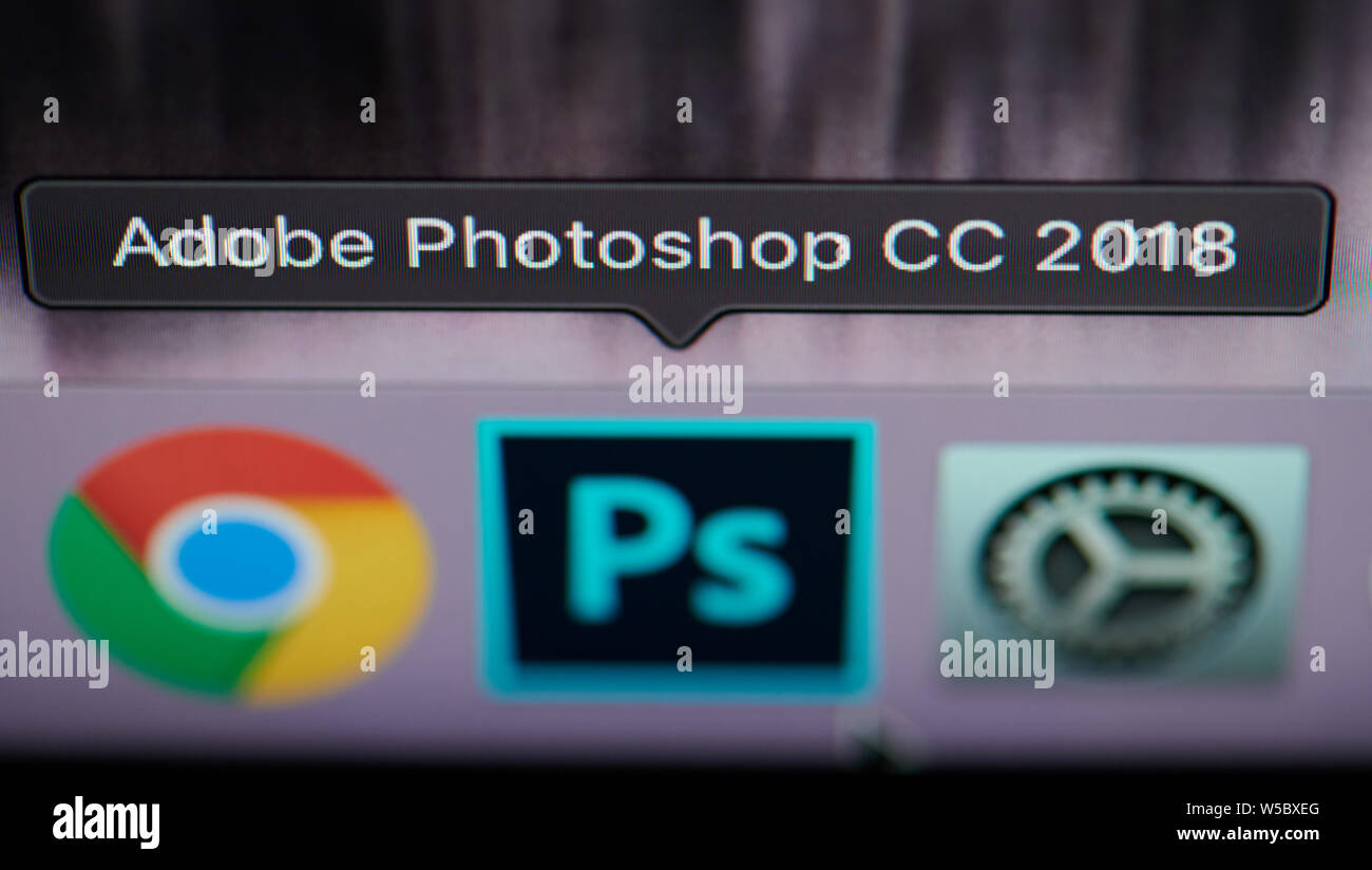 New york, USA - july 26, 2019: Selecting photoshop application on computer macro close up view in pixel screen Stock Photo
