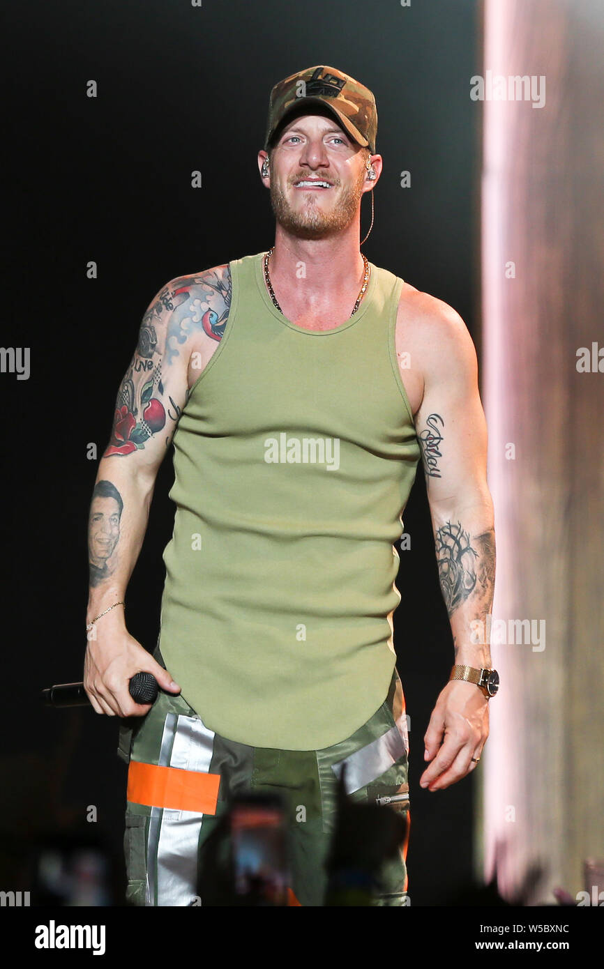 WANTAGH, NY - JUL 20: Tyler Hubbard of Florida Georgia Line performs on July 20, 2019 at Jones Beach in Wantagh, New York. Stock Photo