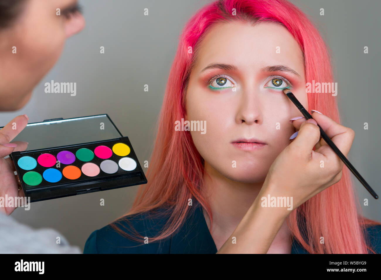 Professional makeup. Perfect skin. Beauty fashion model girl creative art  makeup. Trendy color modern stylish hairstyle. Ombre with purple hair.  Sweet Stock Photo - Alamy