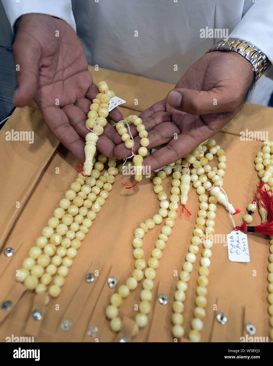 Kuwait City, Kuwait. 27th July, 2019. Beads are displayed at a bead
