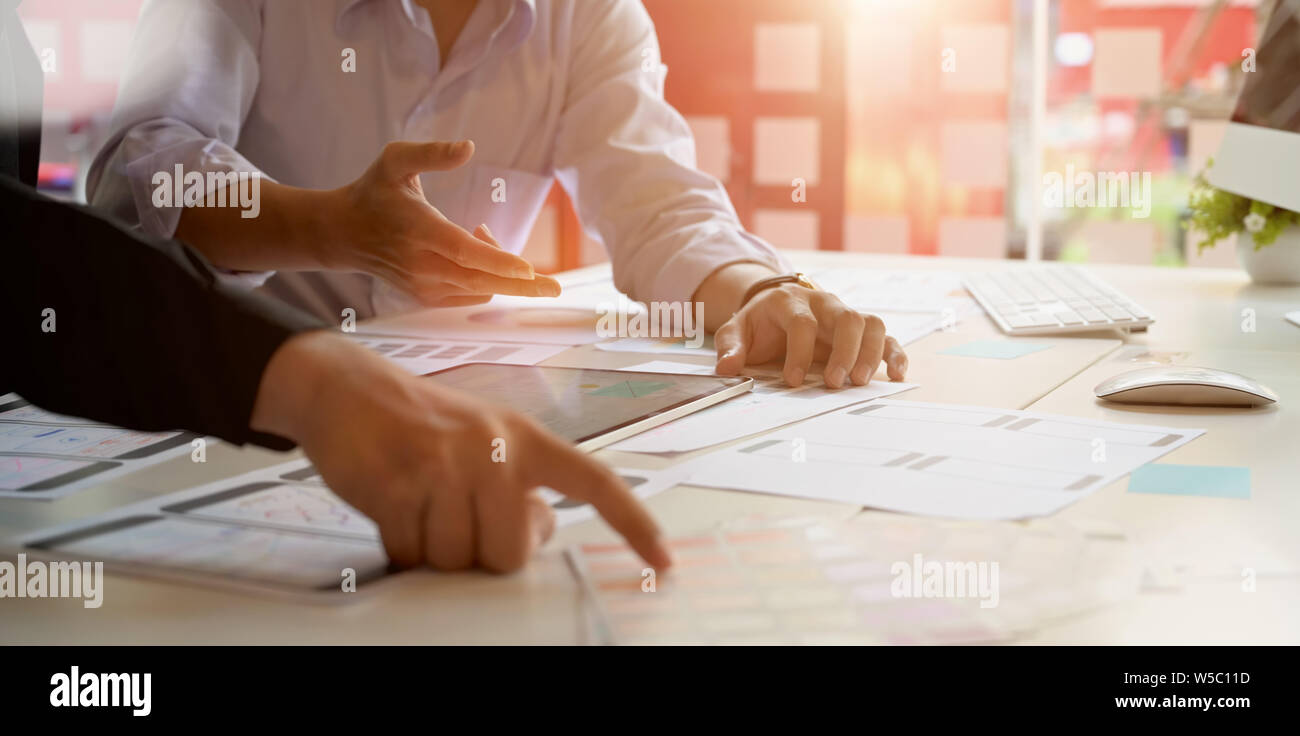 Creative designer drawing website ux app development for web mobile smart phone. Stock Photo