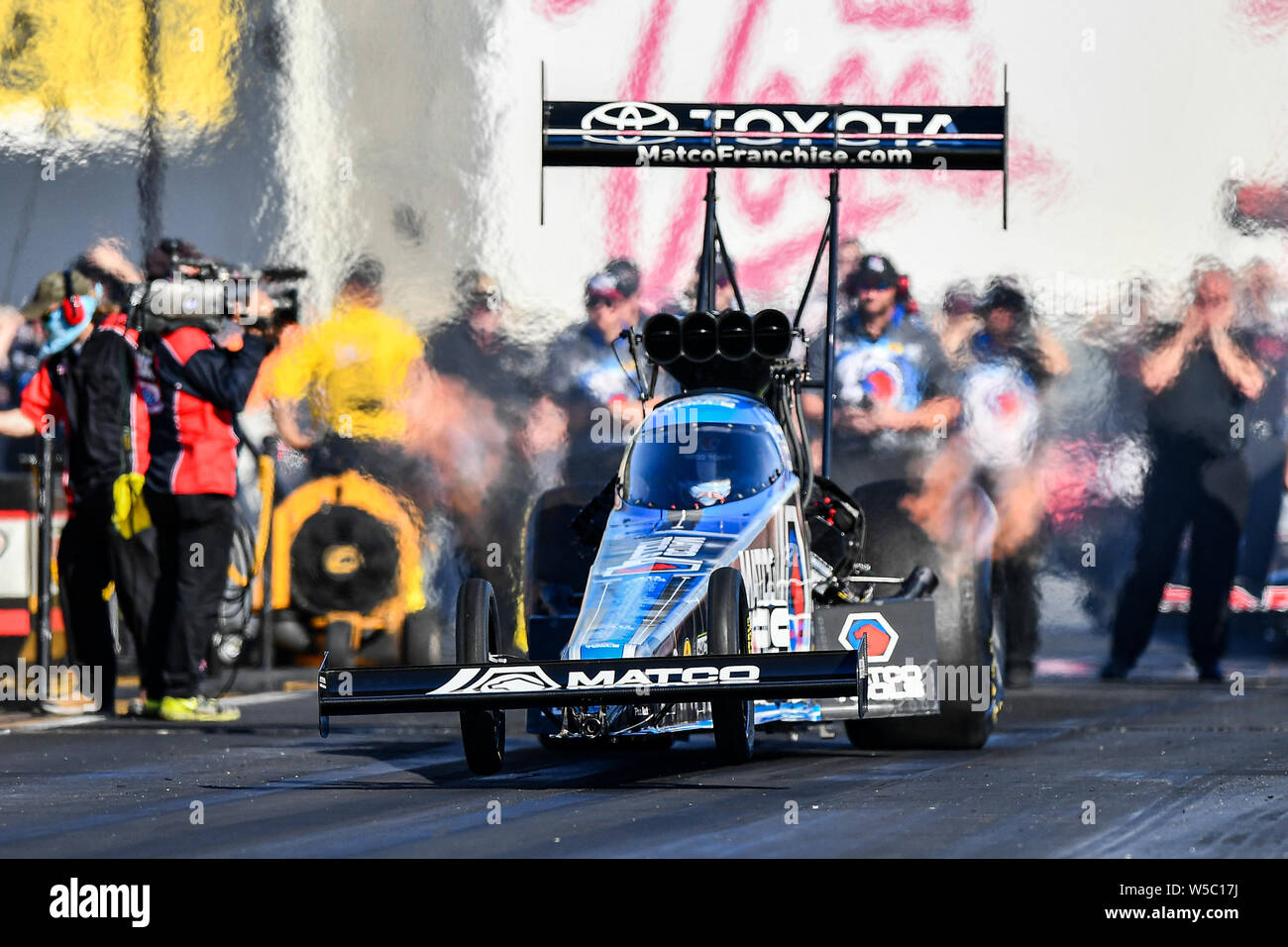Sonoma, California, USA. 27th July, 2019. Antron Brown latches his top fuel dragster during the NHRA Sonoma Nationals at Sonoma Raceway in Sonoma, California. Chris Brown/CSM/Alamy Live News Stock Photo
