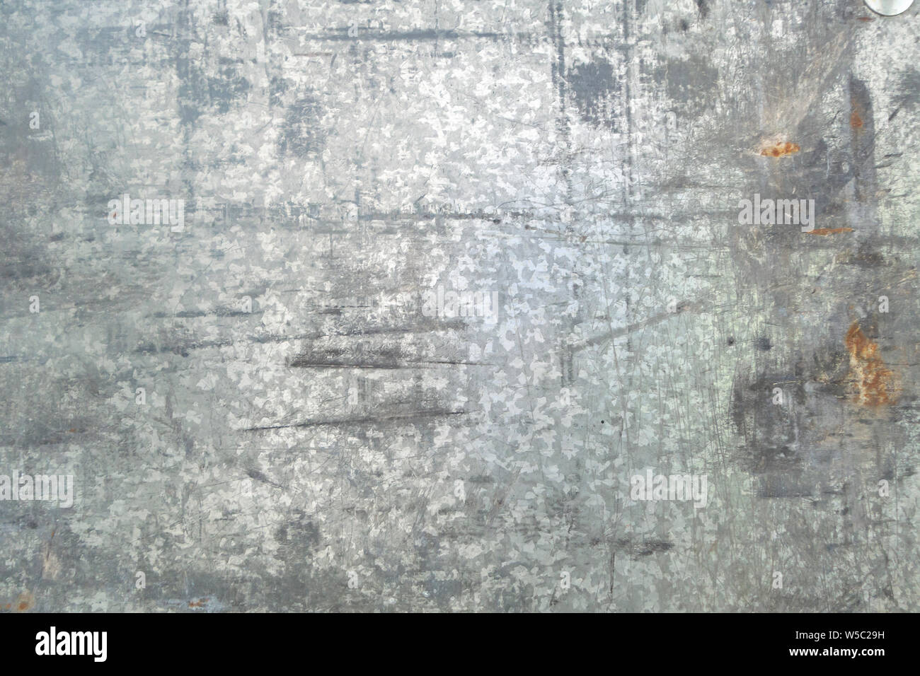 silver Patterned Galvanized Steel surface distressed and weathered Stock Photo