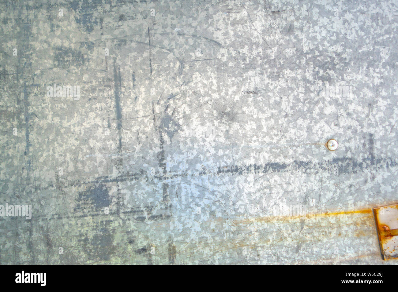 silver Patterned Galvanized Steel surface distressed and weathered