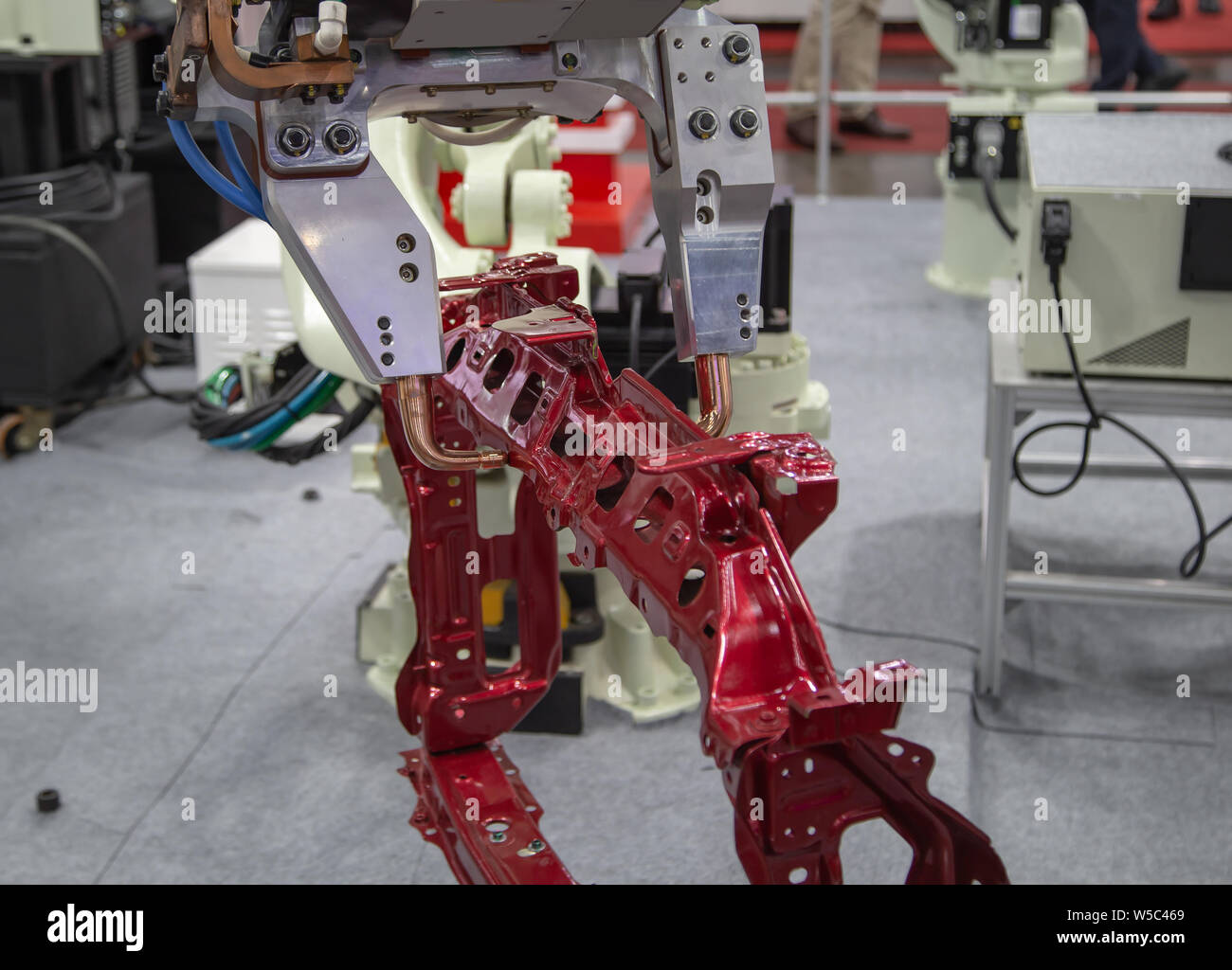 Automated robotic arm spot welding in automotive industry Stock Photo