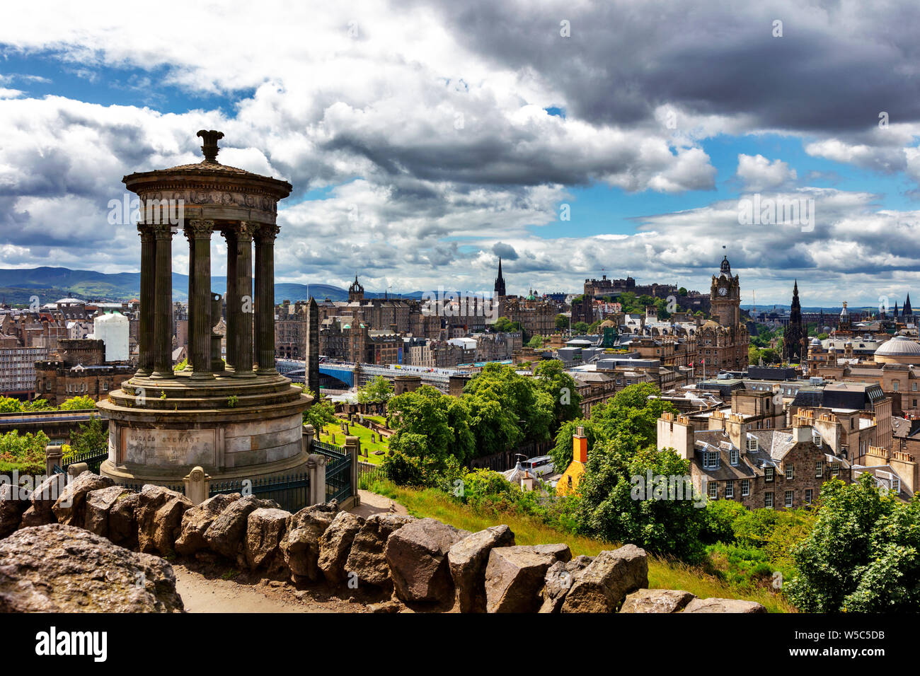 View from Caltoun Hill with the Dugald Steward Monument over the historic old town with Edinburgh Castle, Edinburgh, Scotland, United Kindom Stock Photo