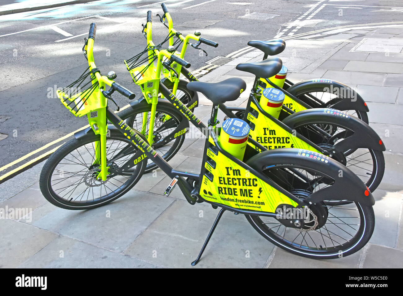 Electric bike for rent parked on pavement in City of London & ready to activate via mobile phone app & return to a virtual station as shown on app UK Stock Photo