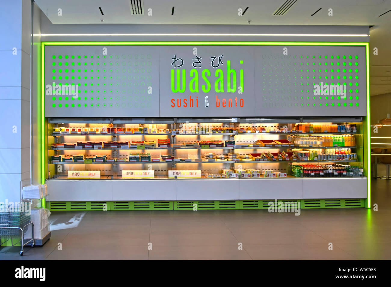 Interior of Wasabi sushi bento fast food restaurant & self service snack bar for Japanese food take away in chilled display counter London England UK Stock Photo
