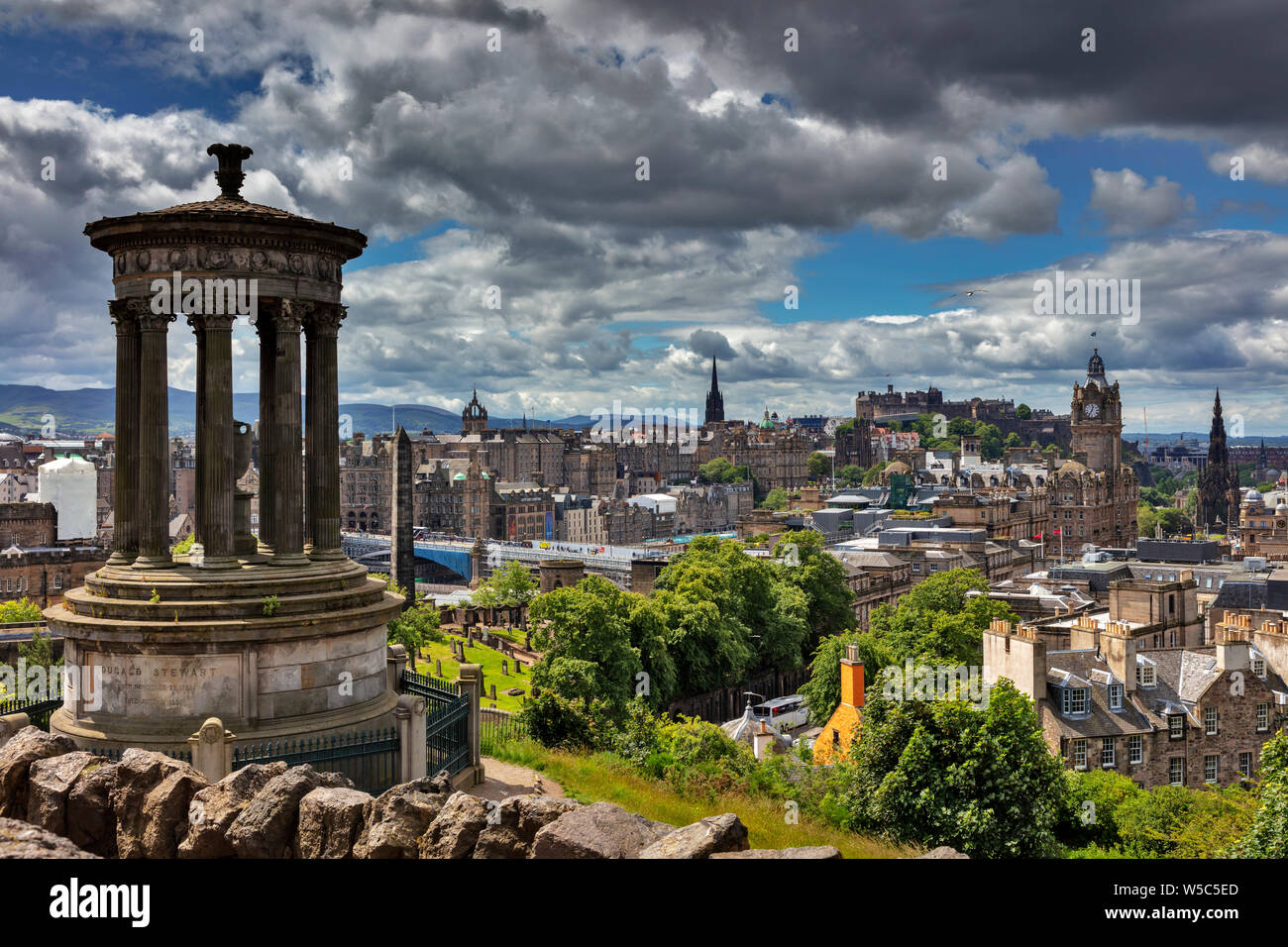 View from Caltoun Hill with the Dugald Steward Monument over the historic old town with Edinburgh Castle, Edinburgh, Scotland, United Kindom Stock Photo