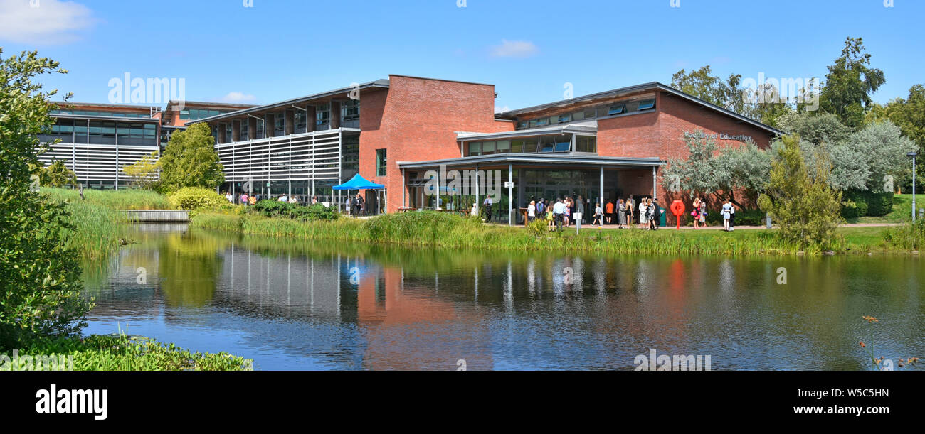 Faculty of Education building Edge Hill University campus  for Initial Teacher Training courses at lake landscape setting on graduation day England UK Stock Photo