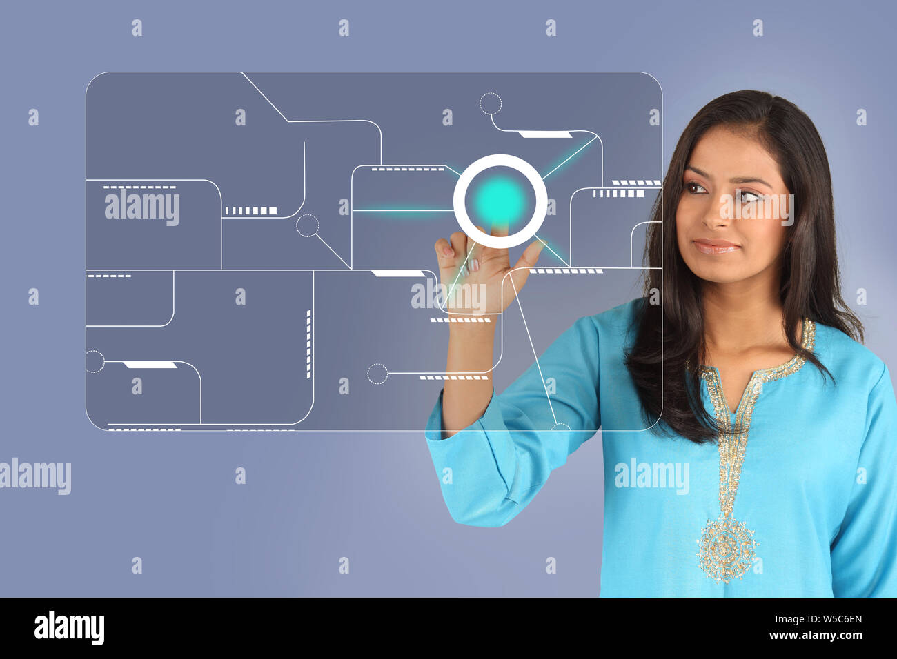Woman using futuristic touch screen Stock Photo