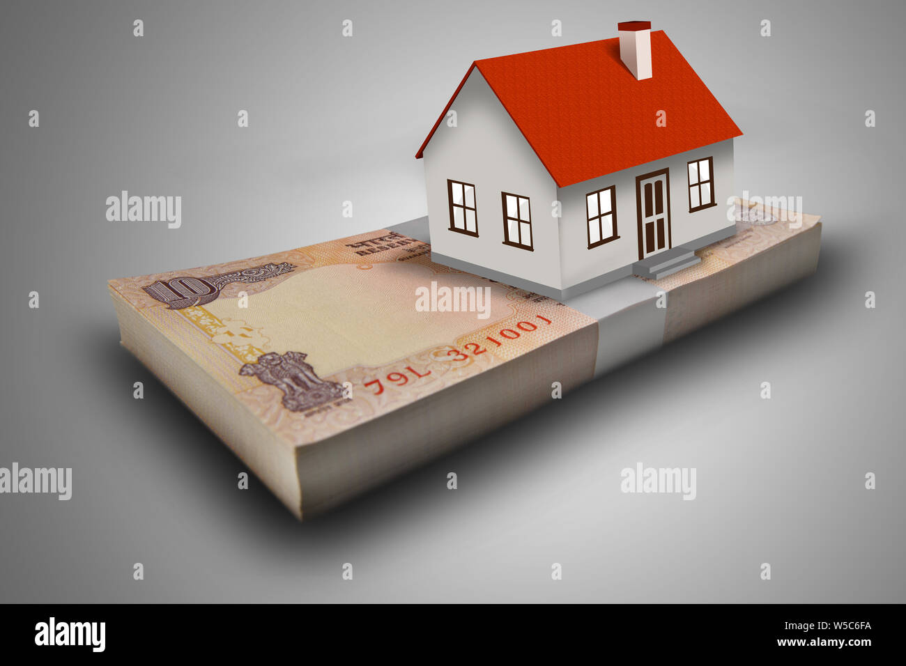 Model home on ten rupee banknotes Stock Photo