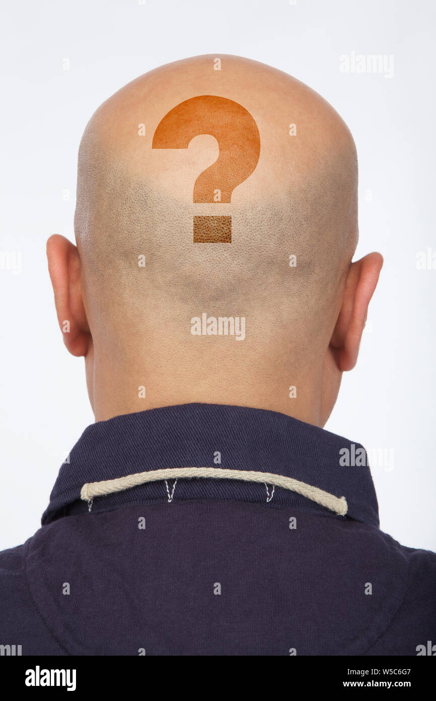 Bald man with question mark on head Stock Photo