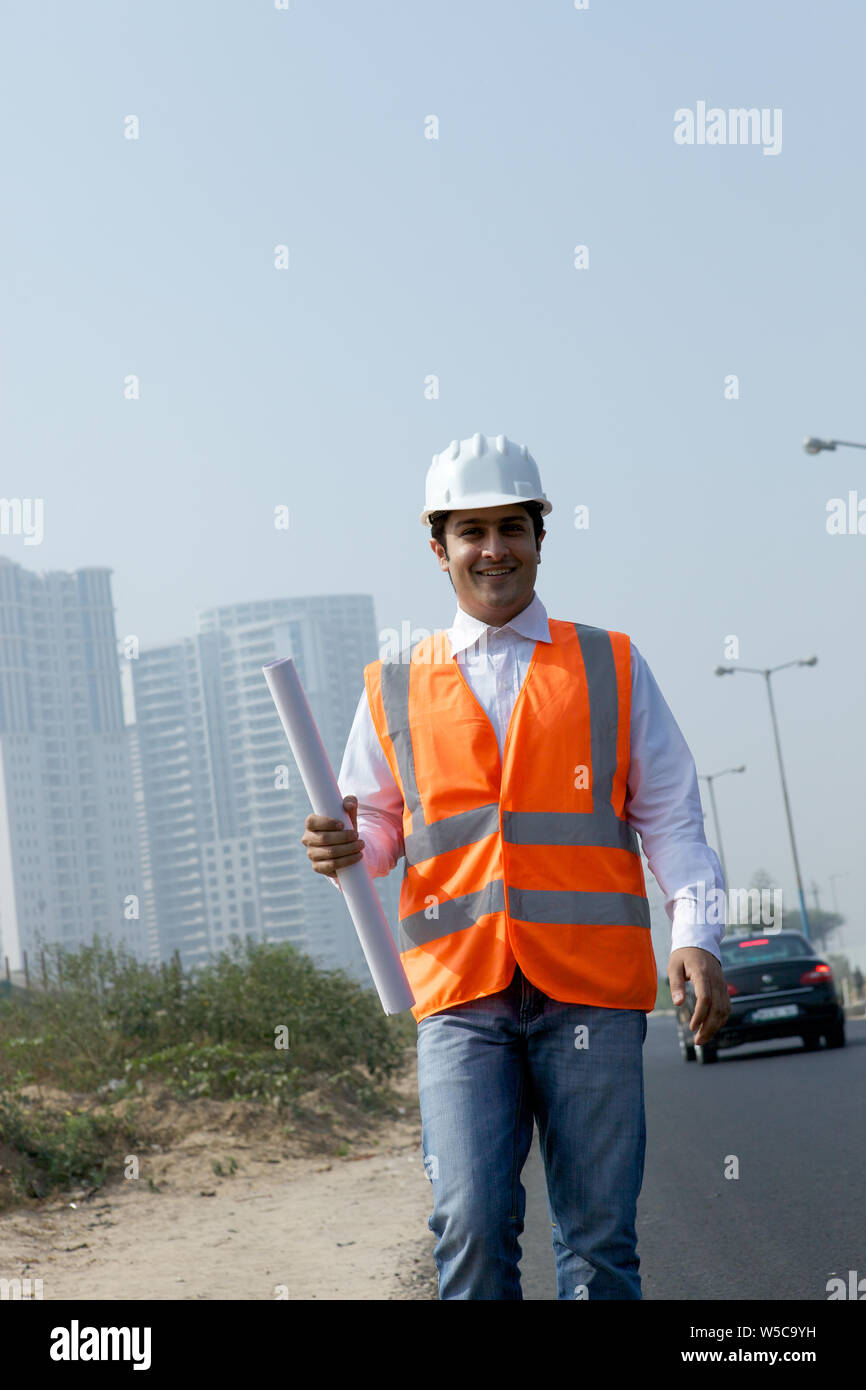 Architect man walking on construction hi-res stock photography and ...