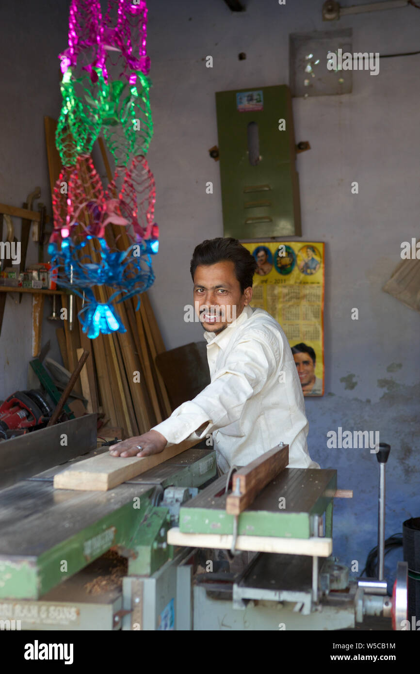 Carpenter working in workshop Stock Photo