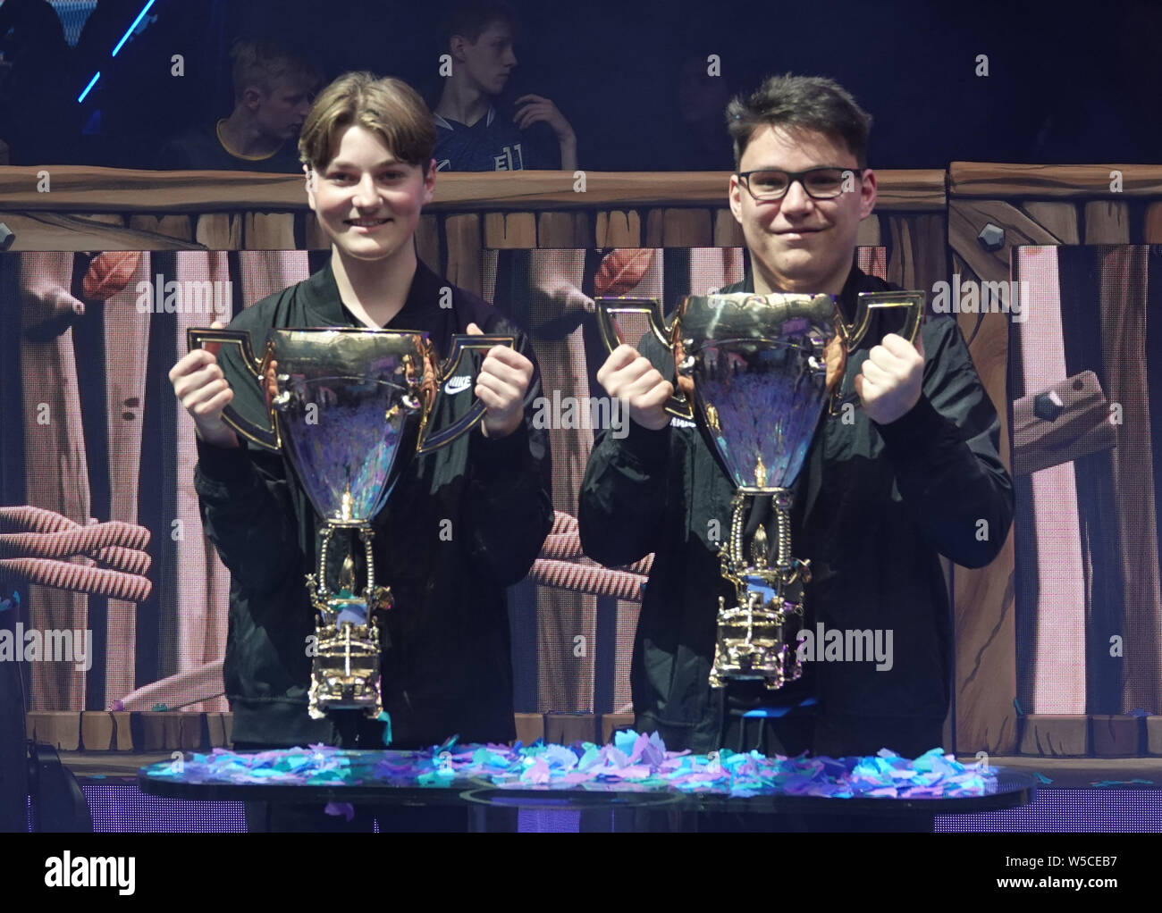 New York, USA. 27th July, 2019. Nyrhox (l) from Norway and his team mate  Aqua from Austria show their trophies. The players of Team Cooler have won  the duo competition of the