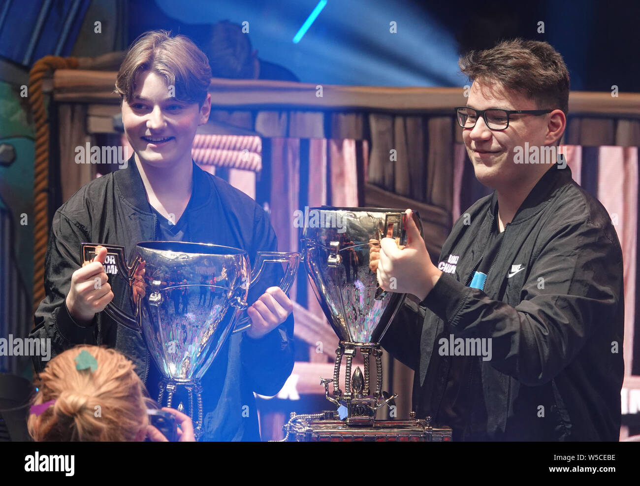 New York, USA. 27th July, 2019. Nyrhox (l) from Norway and his team mate  Aqua from Austria show their trophies. The players of Team Cooler have won  the duo competition of the