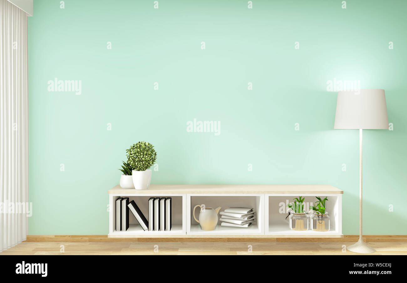 Tv shelf in mint room modern tropical style - empty room interior - minimal design. 3d rendering Stock Photo