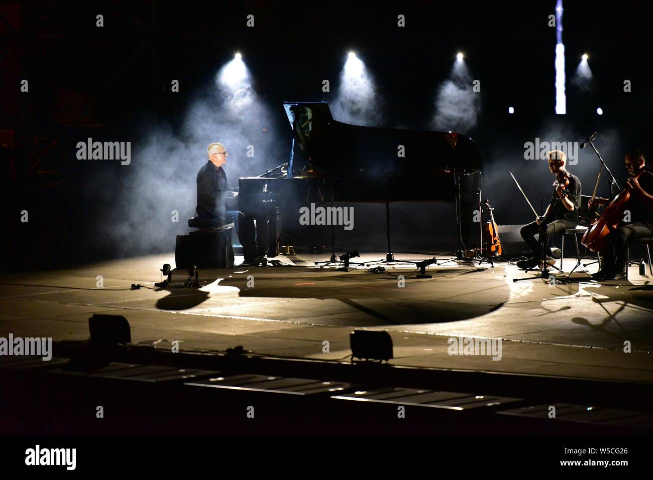 Napoli, Italy. 27th July, 2019. The Italian composer and pianist Ludovico  Einaudi performing live on the stage of the Arena Flegrea during his world  tour Seven Days Walking. Credit: Paola Visone/Pacific Press/Alamy