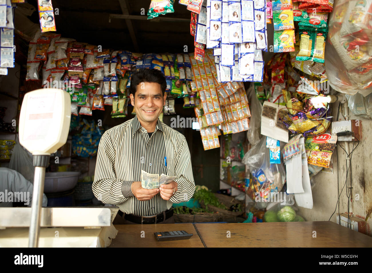 Indian shopkeeper casual clothing hires stock photography and images
