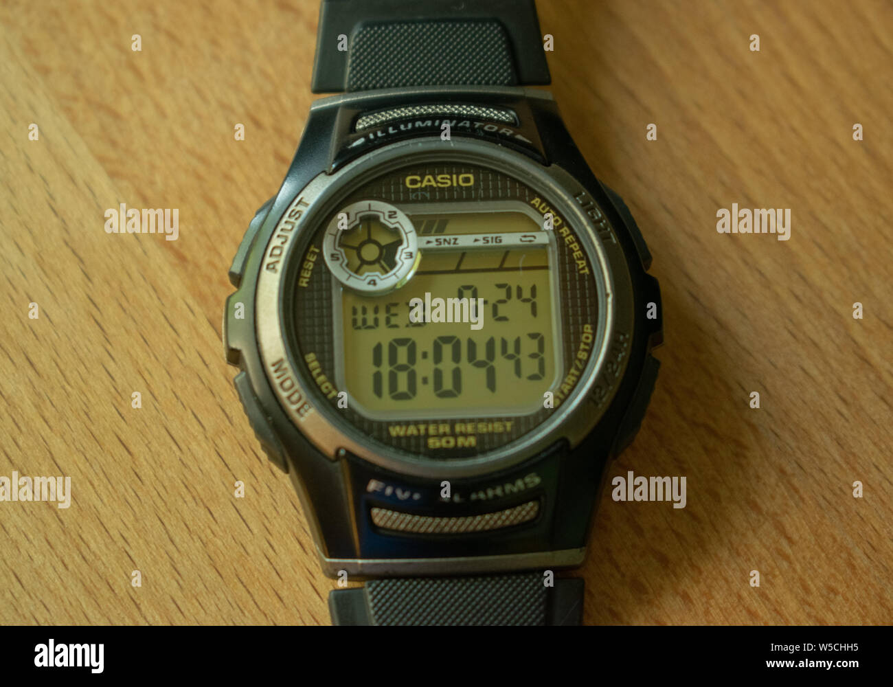 Macro of a Casio waterproof and shockproof watch with the focus on the Casio Logo Stock Photo