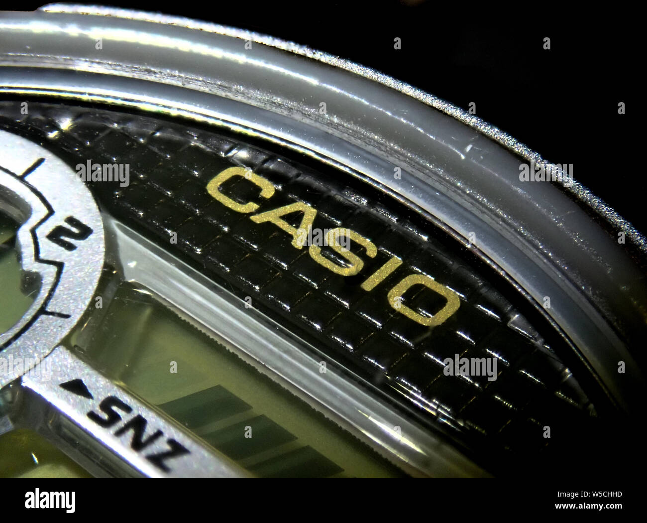 Macro of a Casio waterproof and shockproof watch with the focus on the Casio Logo Stock Photo