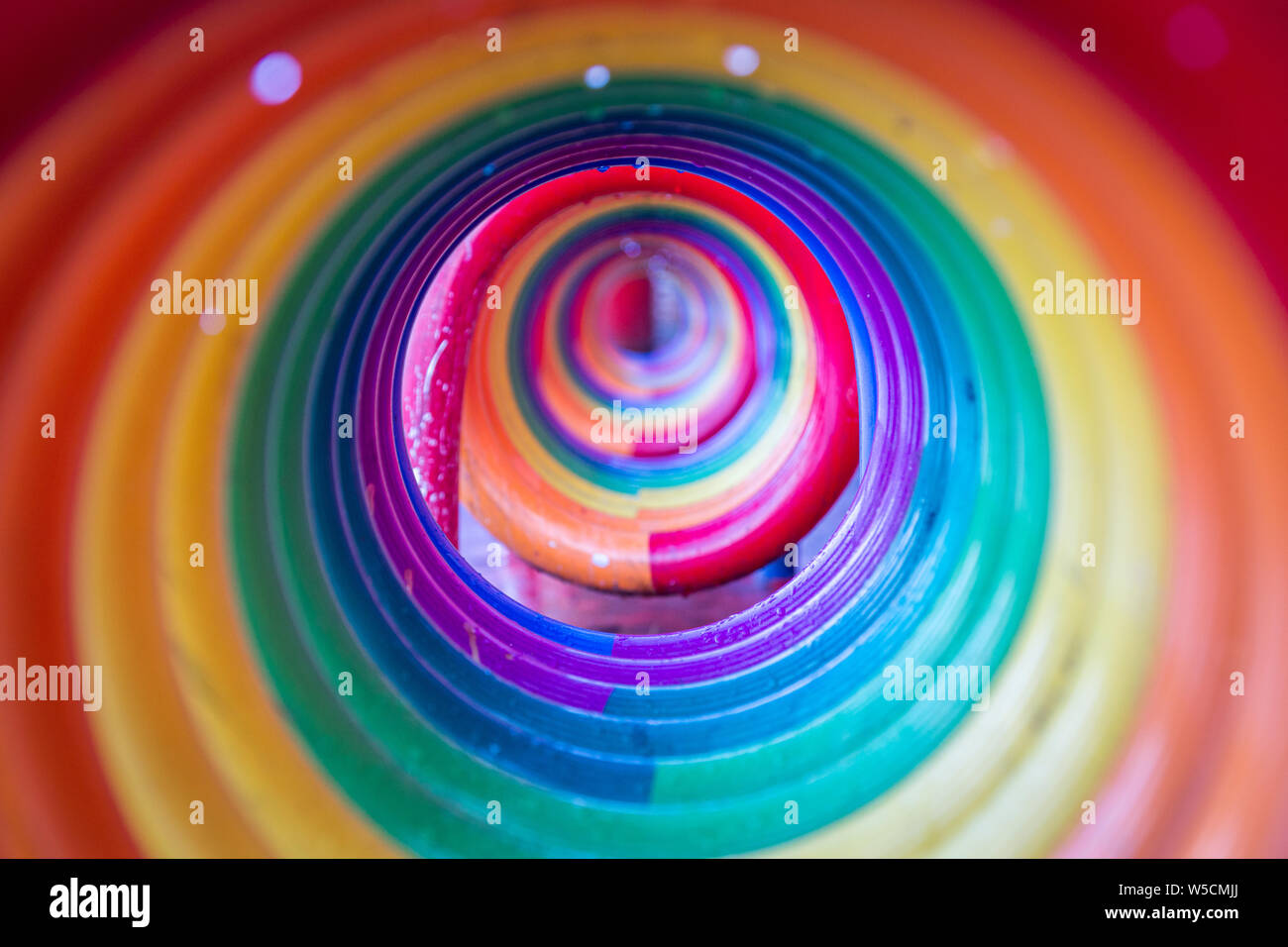 Rainbow colored iron spiral Stock Photo