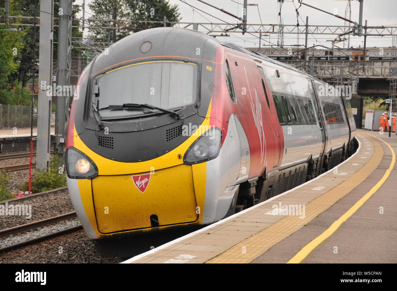 A Virgin Pendolino with 1S63 1140 London Euston Glasgow passing