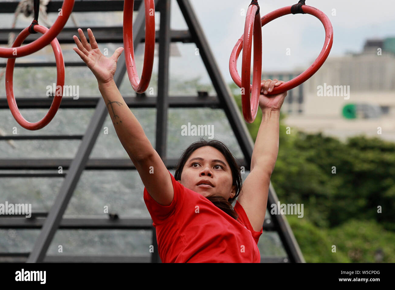 Manila, Philippines. 28th July, 2019. A contestant participates in the 2019 Asia Obstacle Course Race (OCR) Games in Manila, the Philippines, July 28, 2019. Credit: Rouelle Umali/Xinhua/Alamy Live News Stock Photo